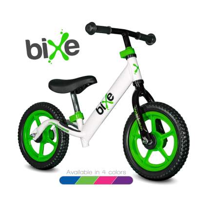 green and white balance bike